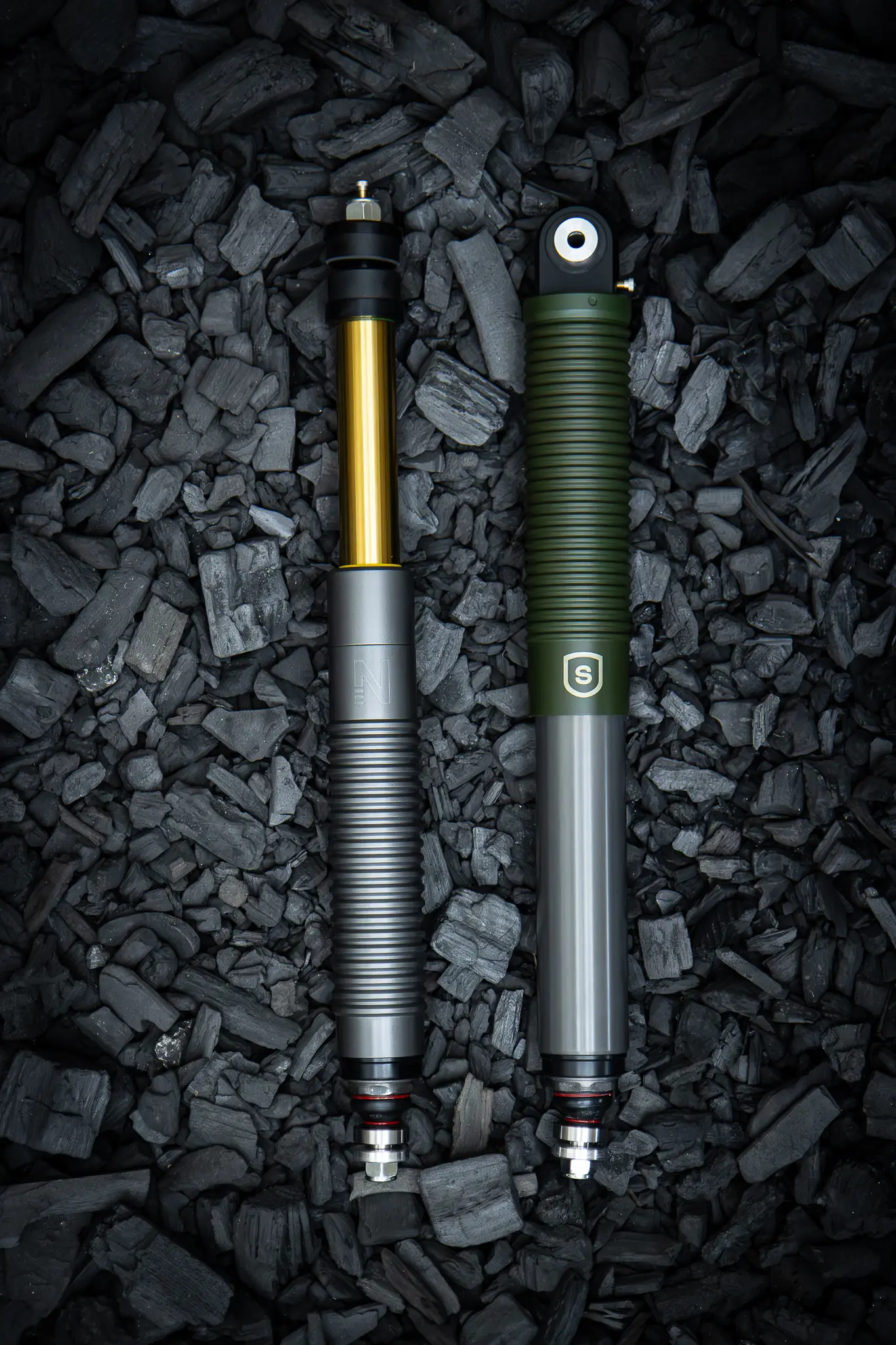 Nimbus Erebus Squire Edition, two struts on a bed of charcoal